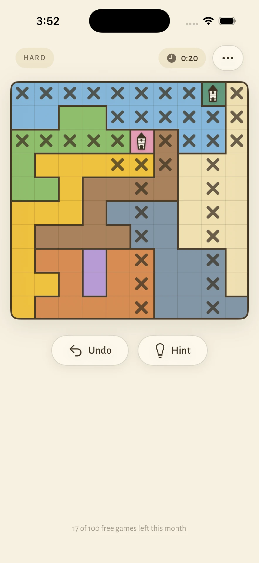 A 10 by 10 Hard Watchtowers puzzle board mid-solve with colored fields, tower markers, and the updated in-game UI